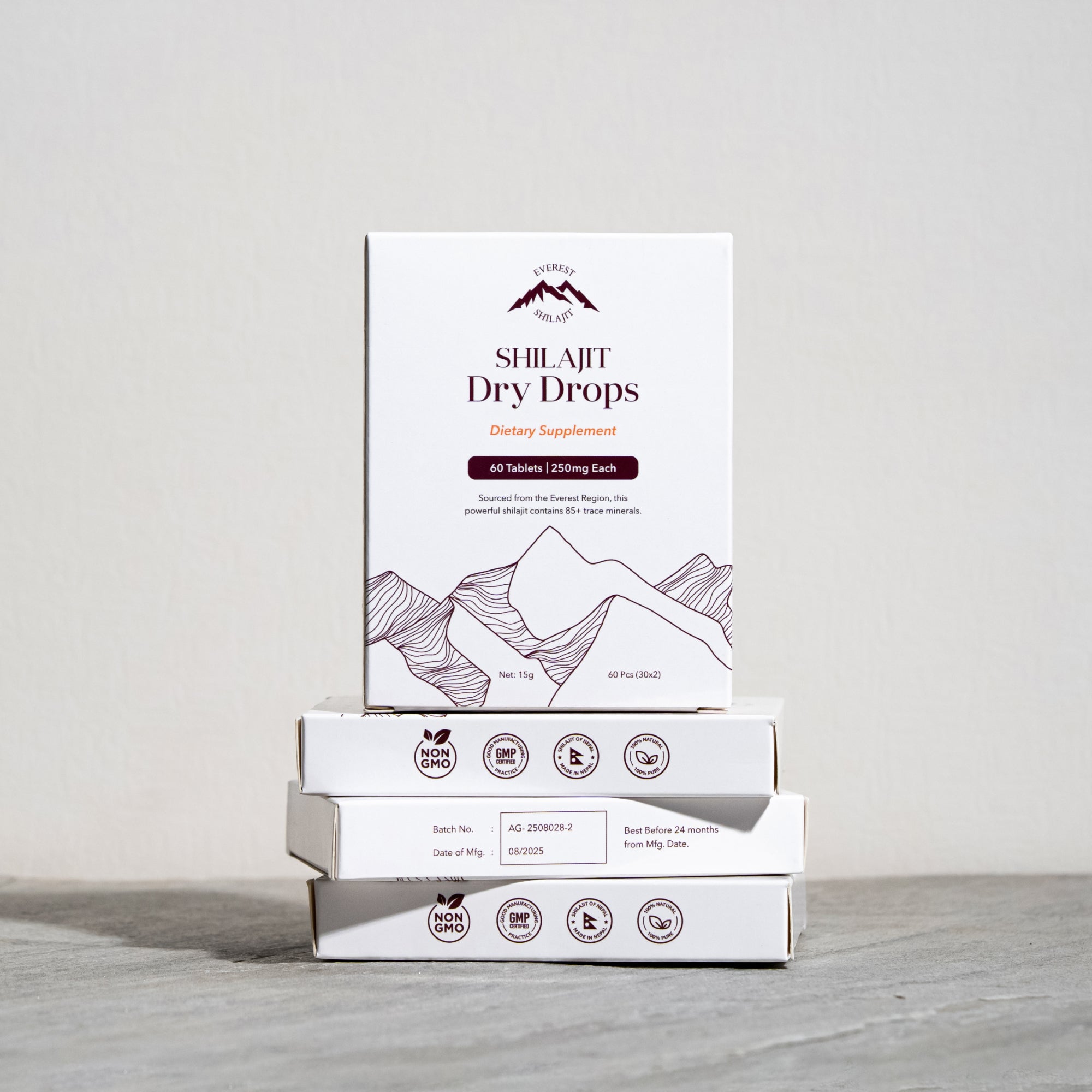 Everest Origin shilajit tablet packaging stack with 60 tablets, 250mg each, and Nepal made quality icons