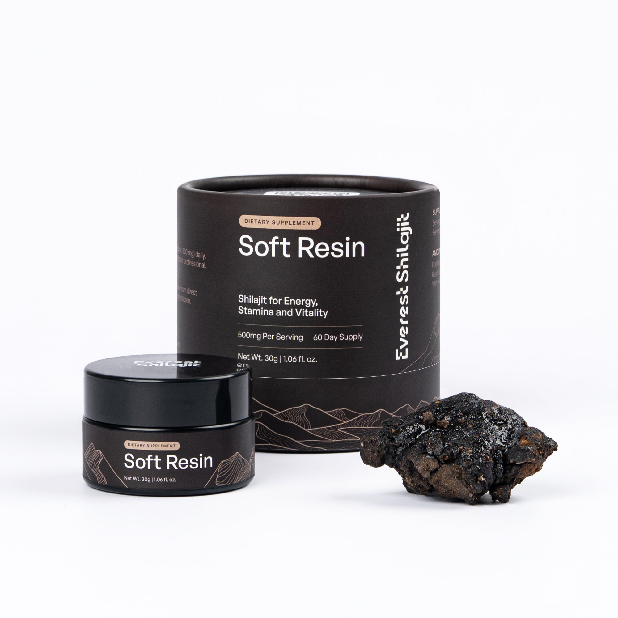 Everest Shilajit 30 g soft resin jar and packaging beside a piece of raw shilajit.