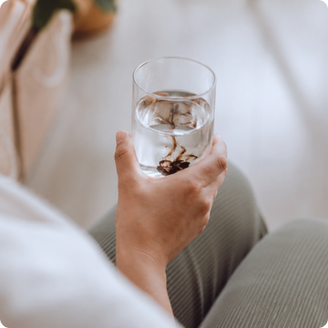 files/person-holding-dissolved-everest-shilajit-liquid-drink.png