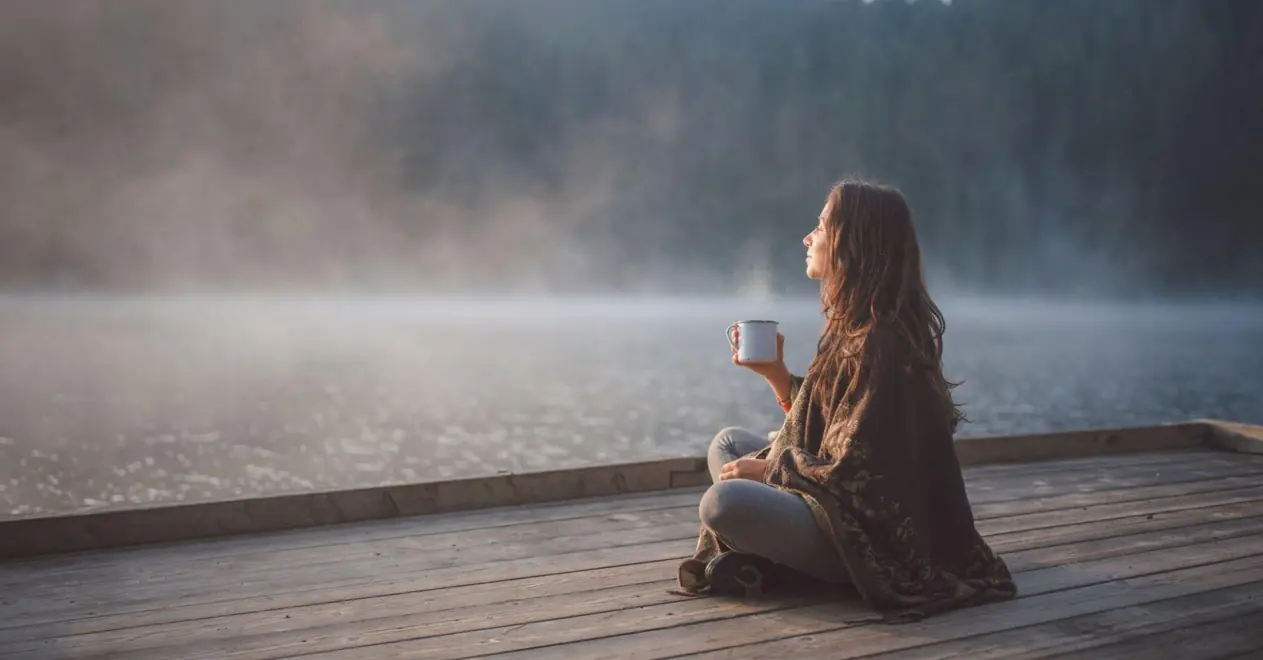 a girl having shilajit with hot water in the morning